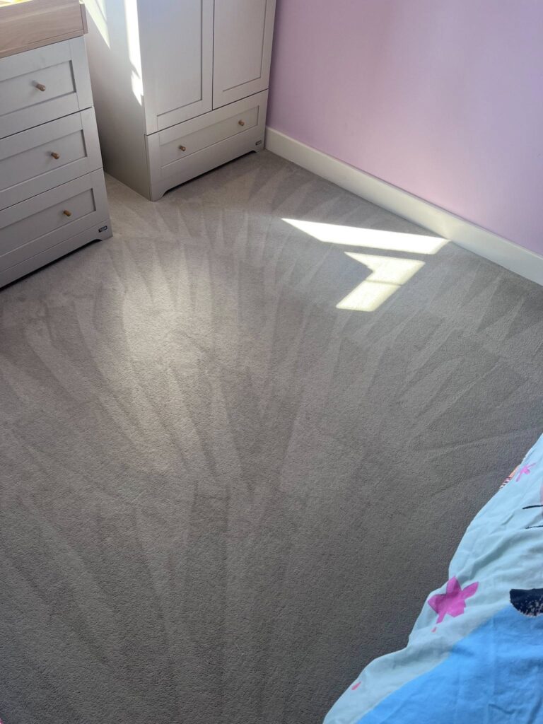Hoovered and spotless bedroom carpet