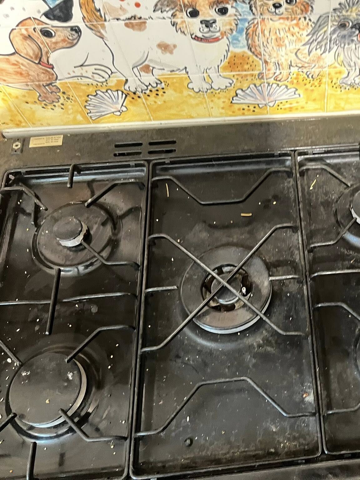 A very dirty oven hob